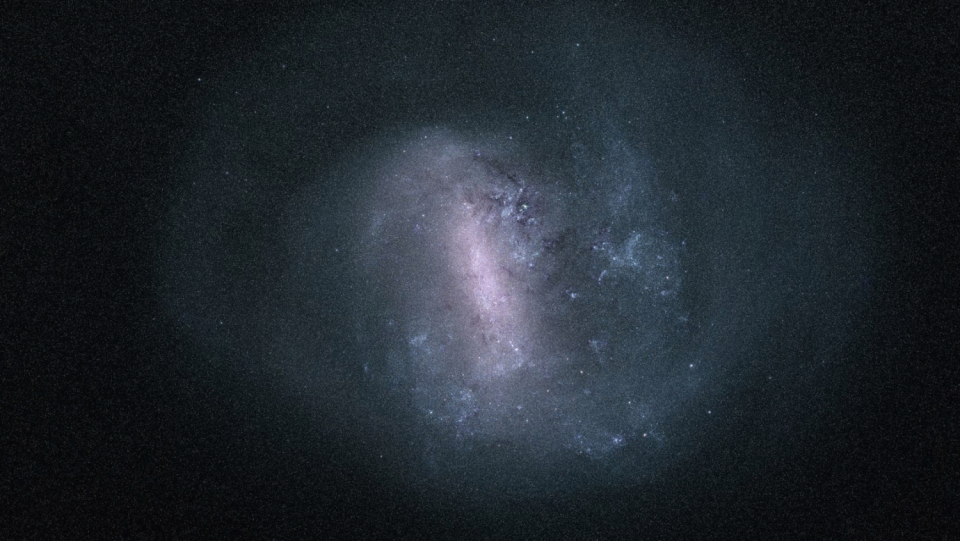 Bigger galaxies expand by merging with smaller ones.
The globular cluster of NGC 2005 serves as an illustration of how compact galaxies expand by ingesting even smaller galaxies in the massive Magellan cloud.